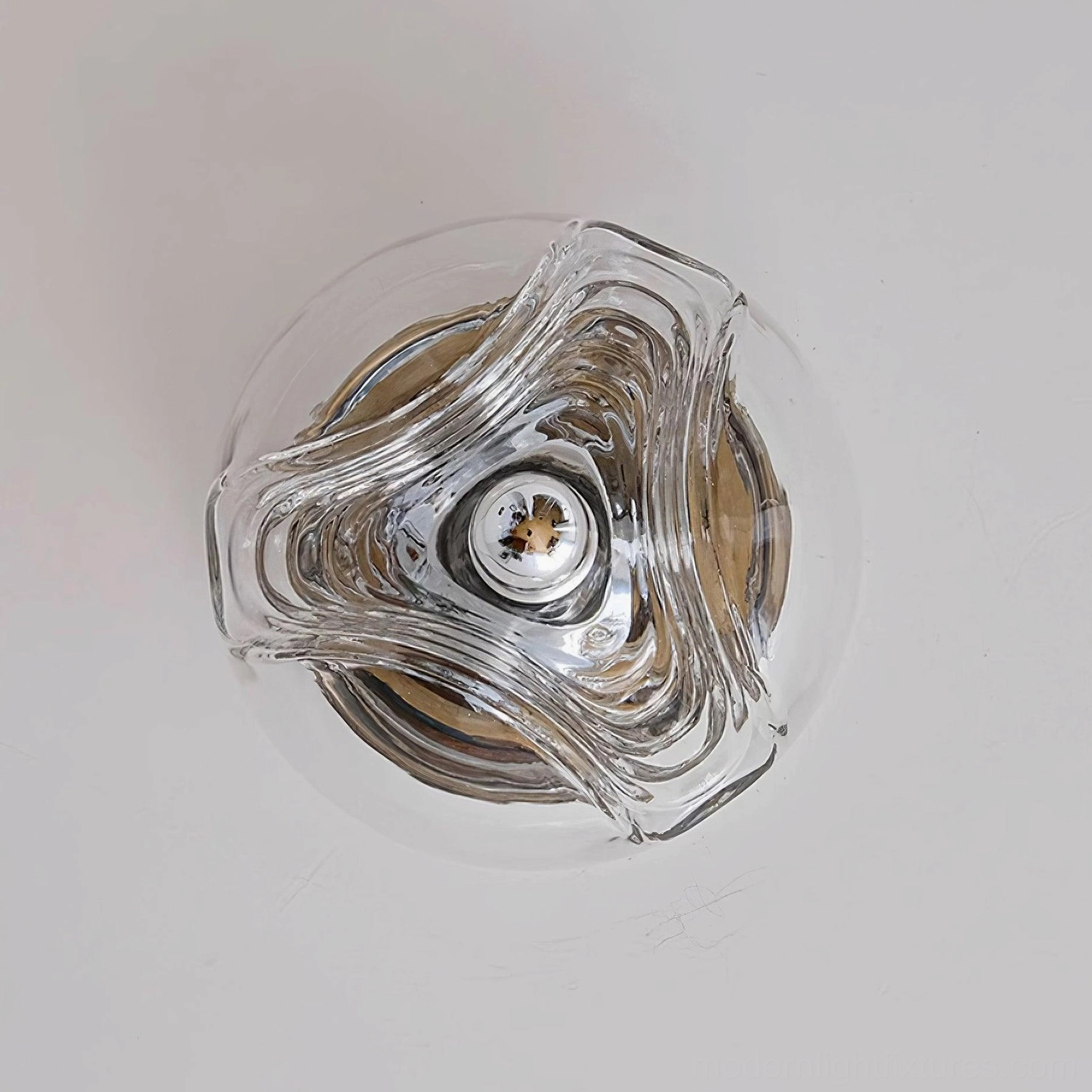 Modern ripple glass wall sconce mid-century modern interior setting