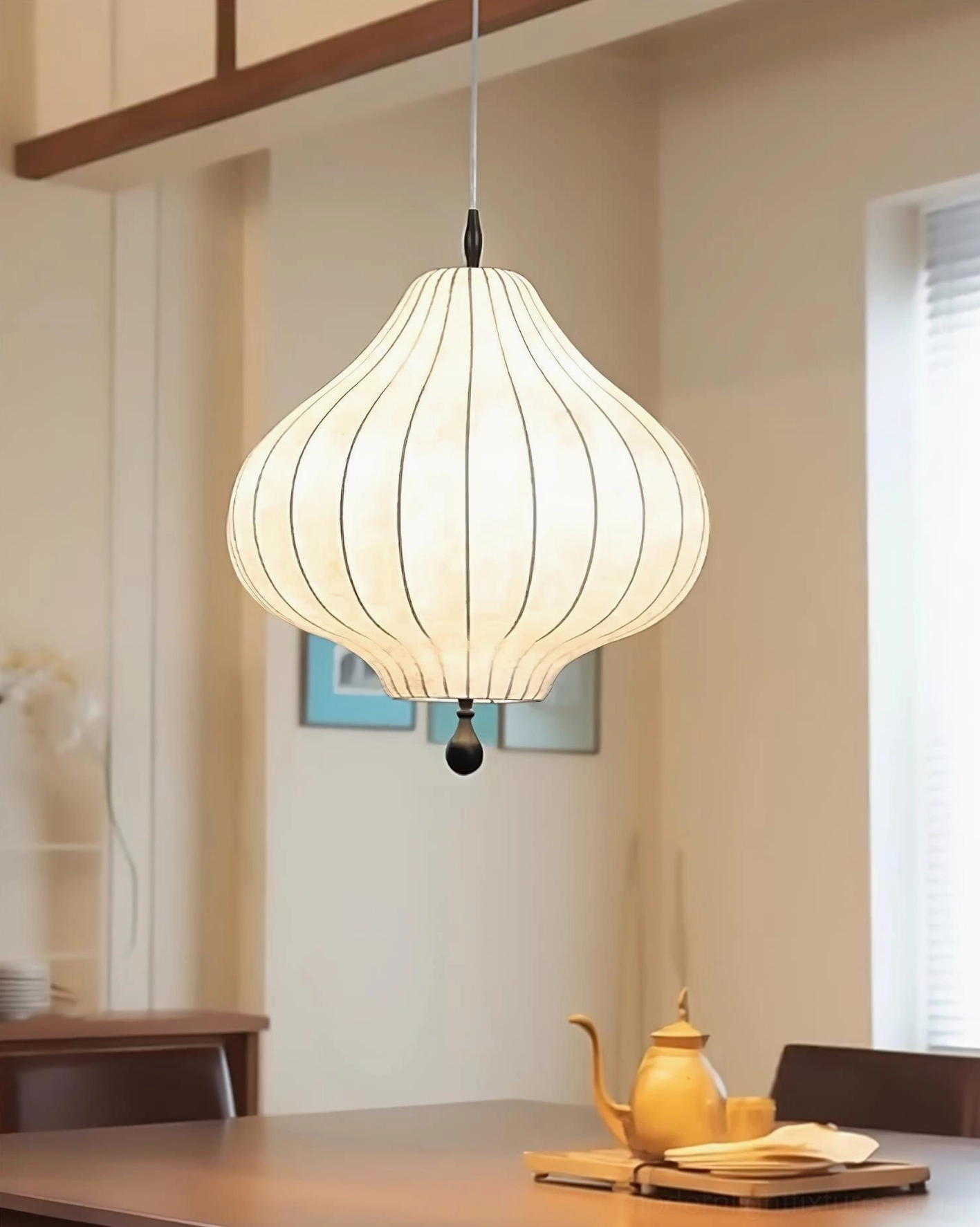 Leocadia striped pendant light over dining table, warm ambient lighting for contemporary dining space