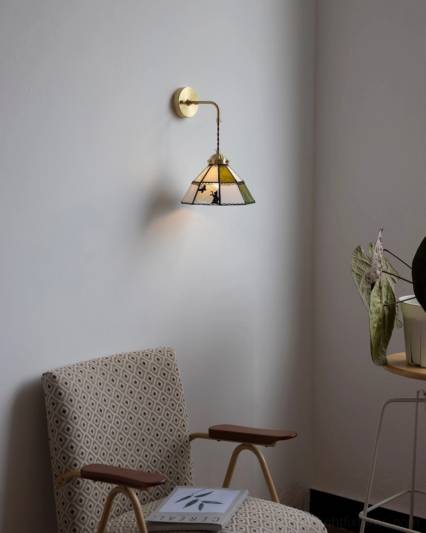 Vintage rabbit silhouette wall sconce in cozy residential corner lighting setup