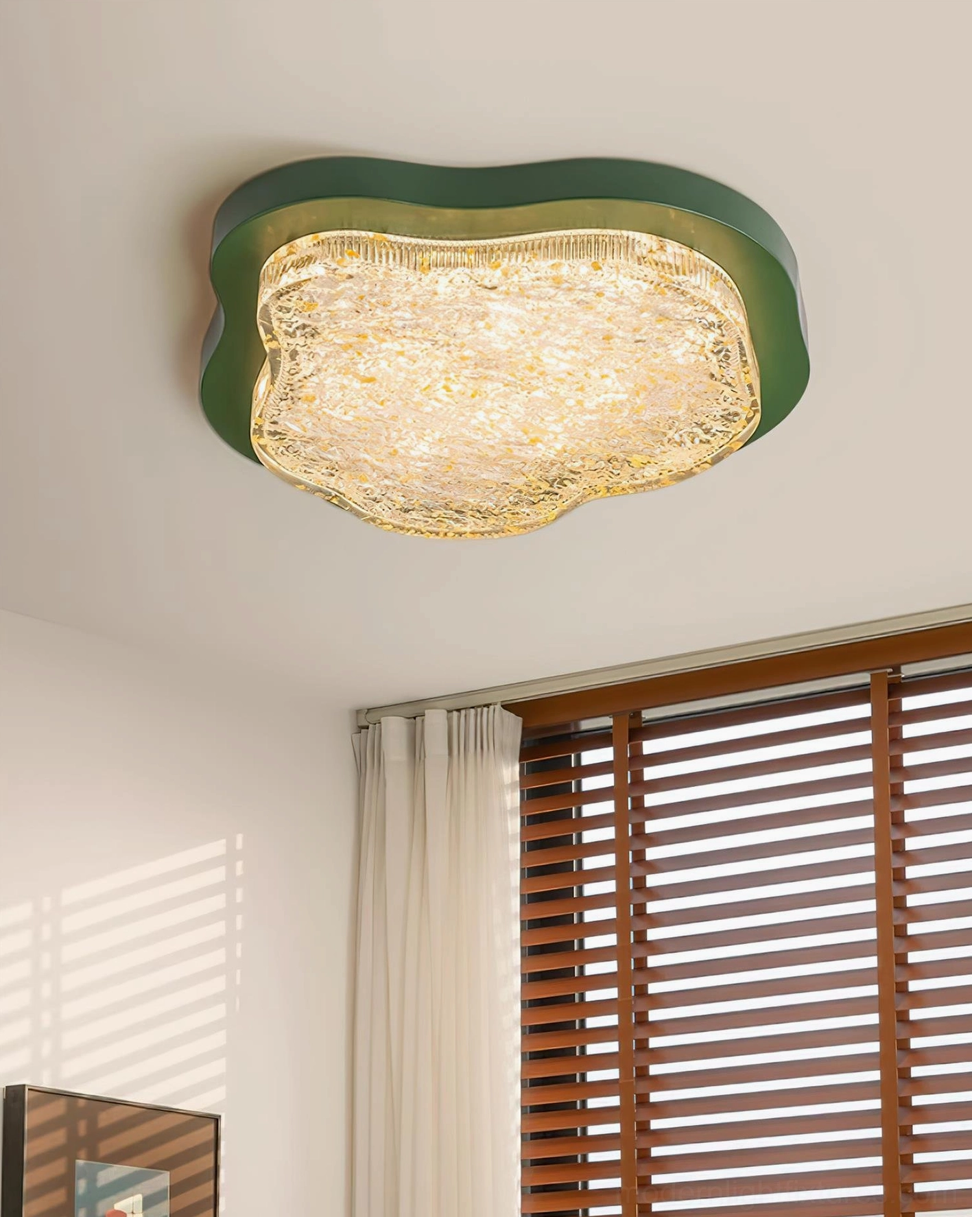 Levante cloud shaped modern ceiling light fixture detail view highlighting gold leaf accents and textured crystal surface
