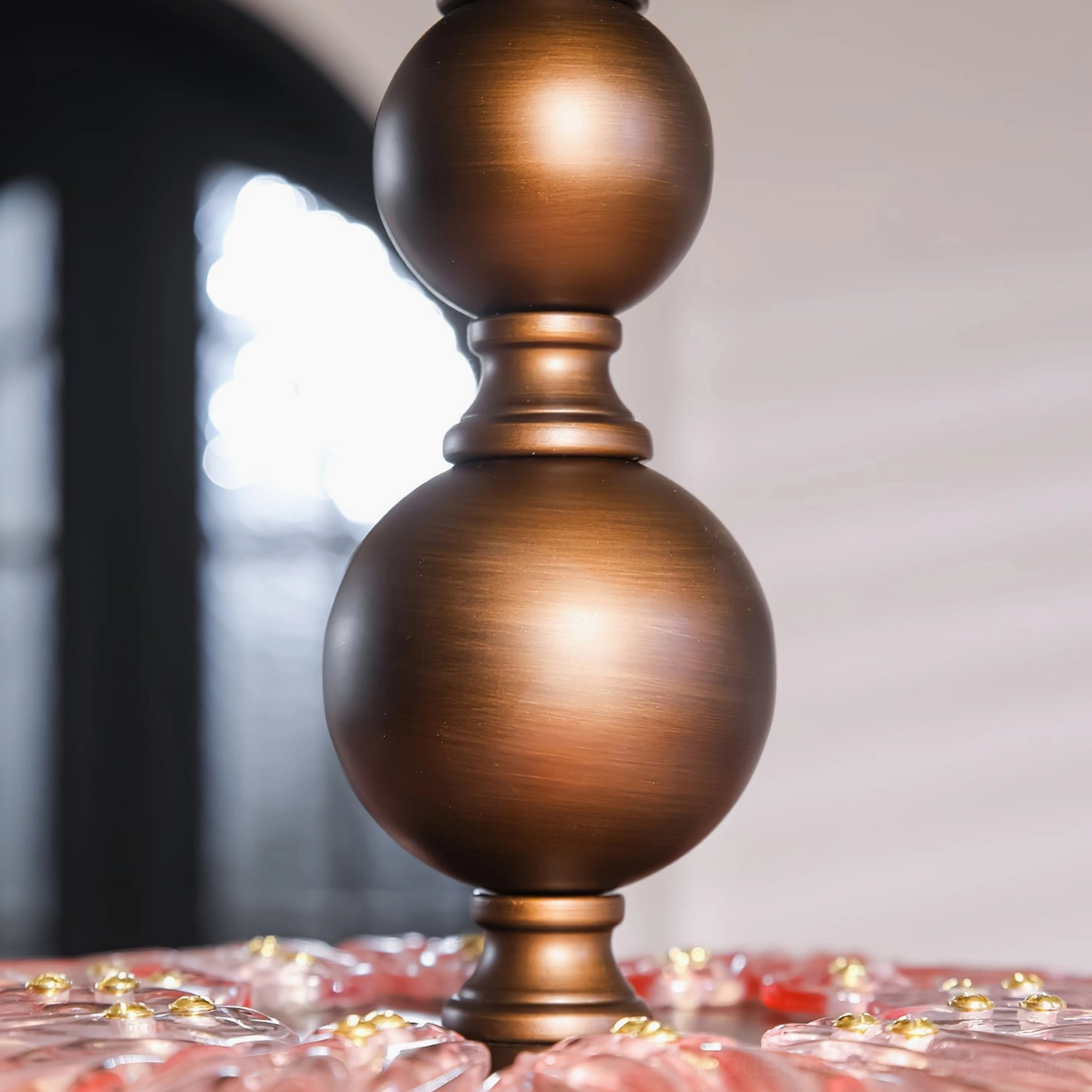 Levara ceiling light fixture angled view showcasing glass petal design and lighting effect