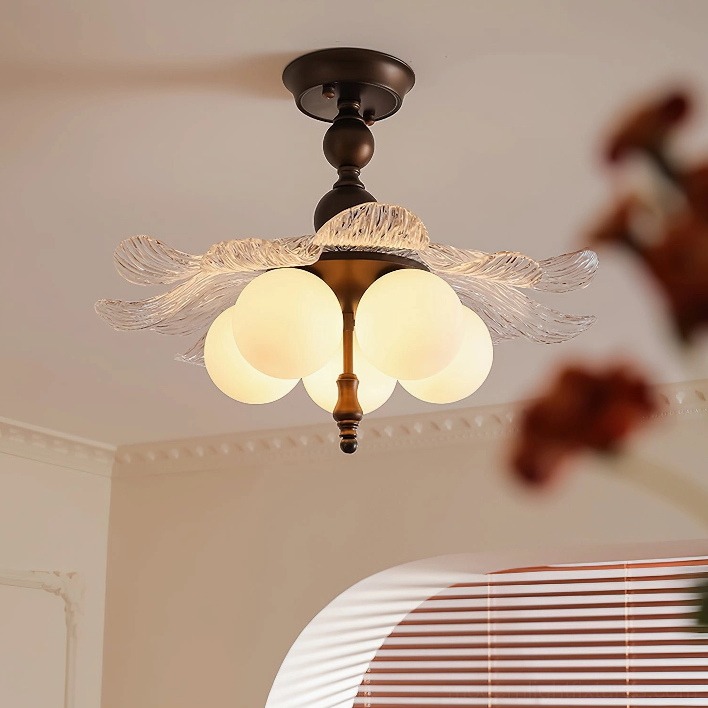 Levara floral ceiling light with red petal glass accents and frosted globe bulbs