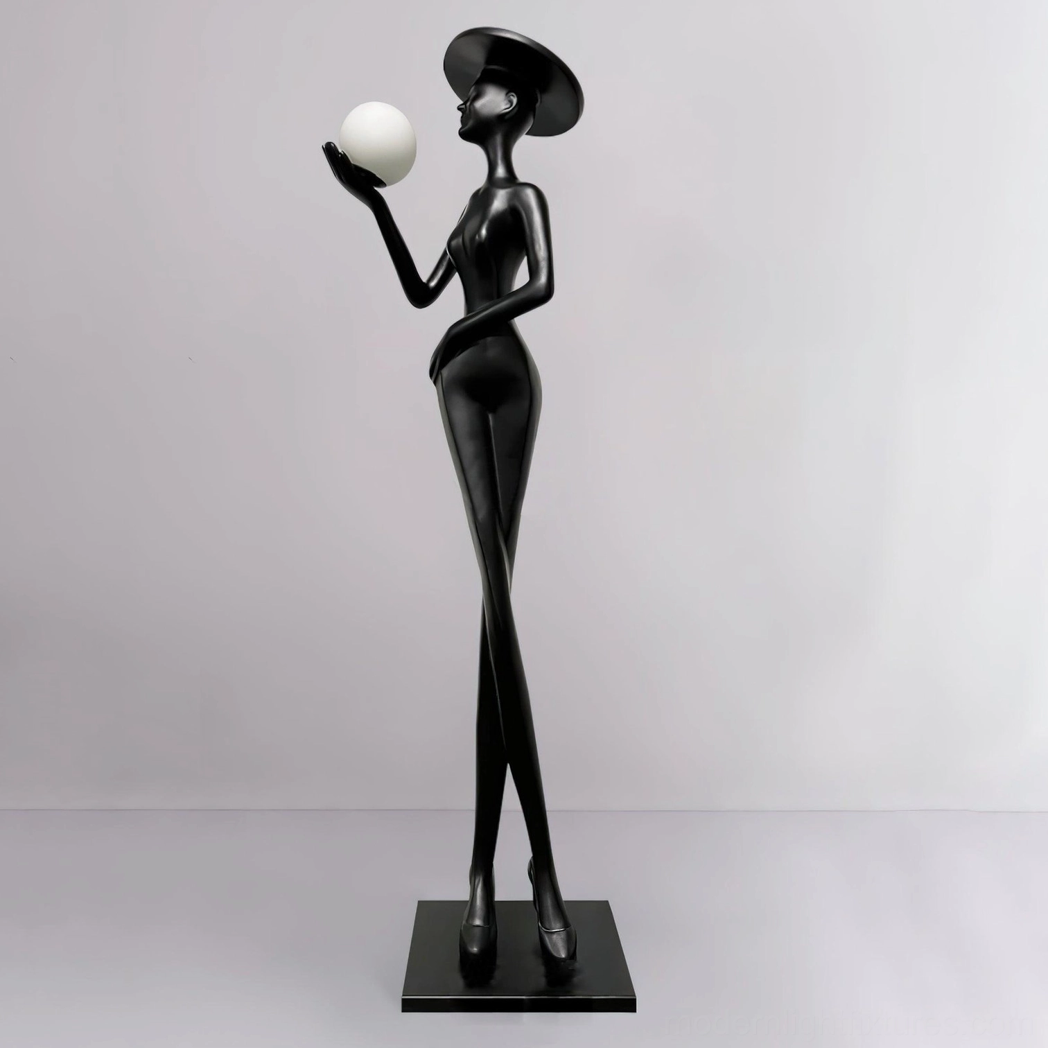 Lexa floor lamp in Black & Blue color option displaying minimalist modern aesthetic with illuminated spherical crown