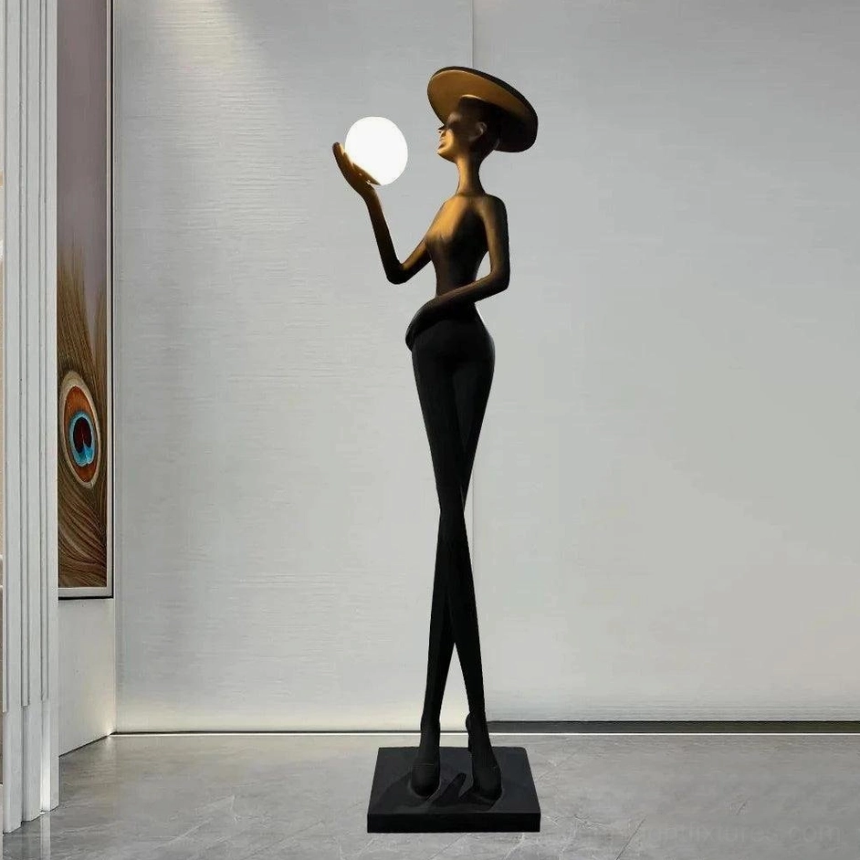 Contemporary Lexa floor lamp in modern hallway setting with glowing white spherical light fixture and minimalist black silhouette