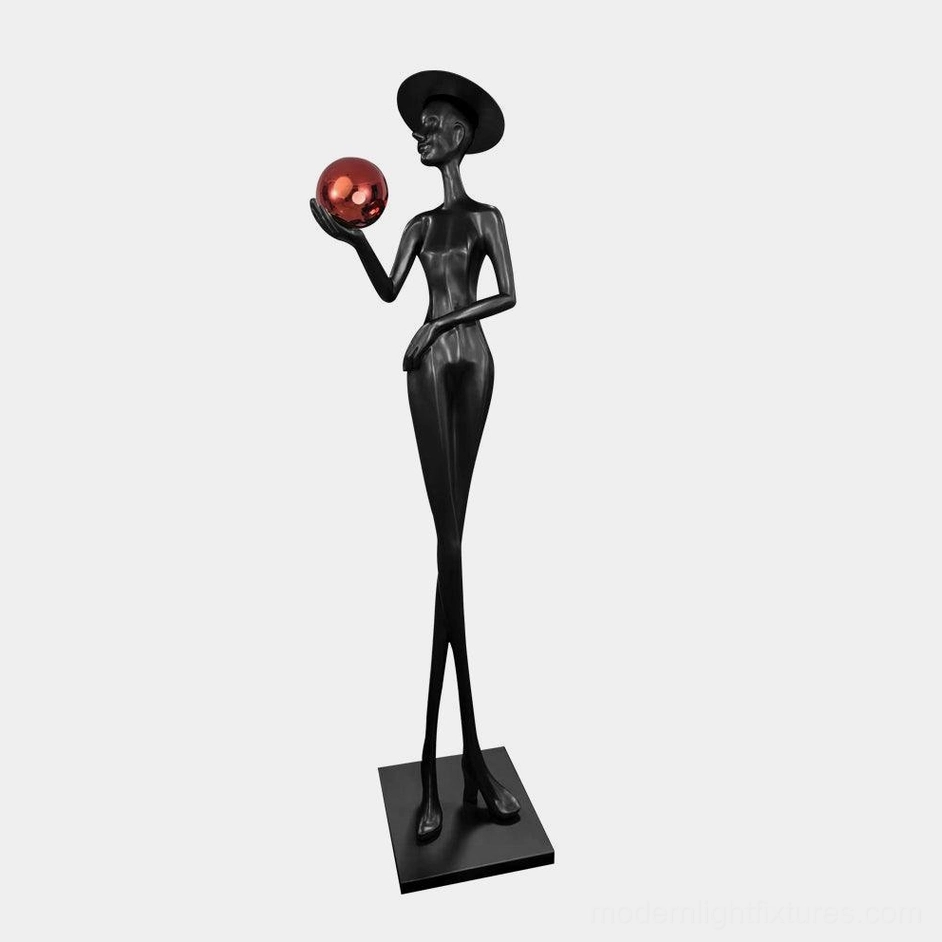 Lexa contemporary art floor lamp Black & Red color showing sculptural silhouette with bold sphere light fixture accent