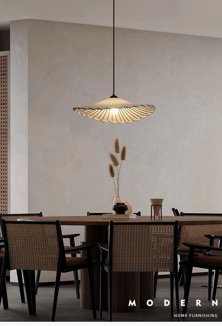 Liana wabi-sabi pendant lamp positioned over dining table creating focal point lighting