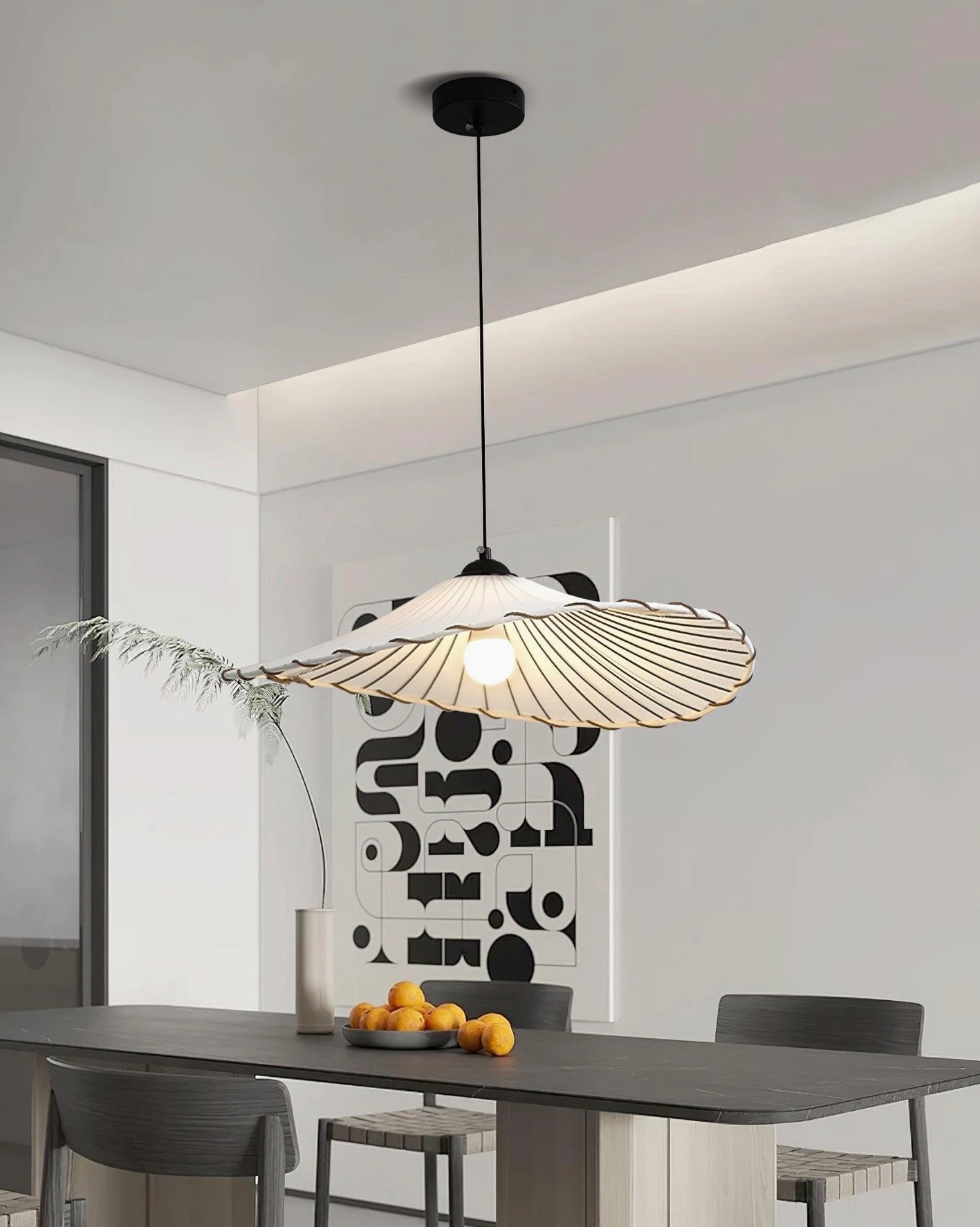 Japanese pleated pendant light in eclectic interior with mixed textures and warm tones