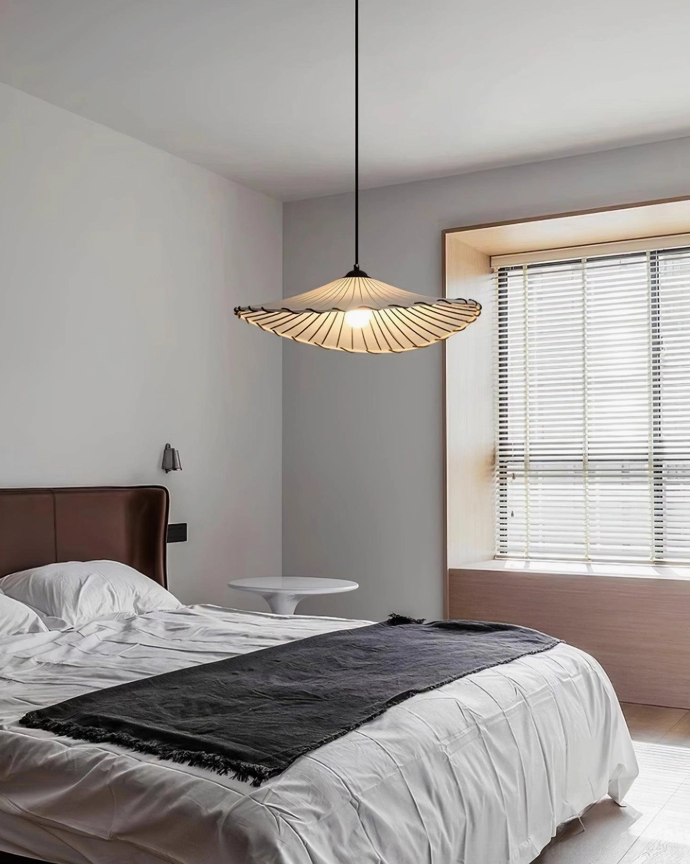 Handcrafted Liana pendant fixture in industrial loft with exposed brick and modern elements