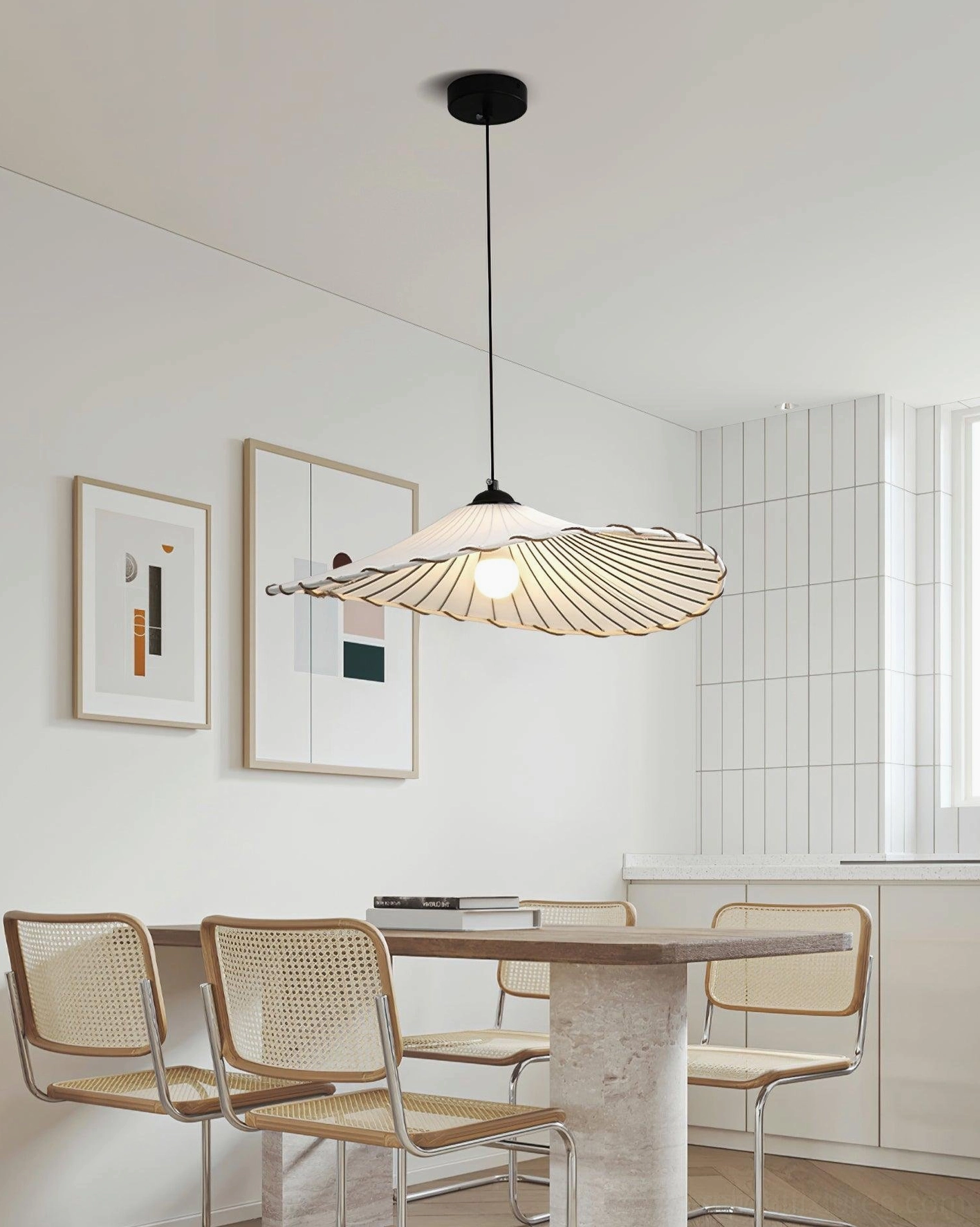 Handcrafted pleated pendant light in open-concept kitchen and dining area with modern aesthetics
