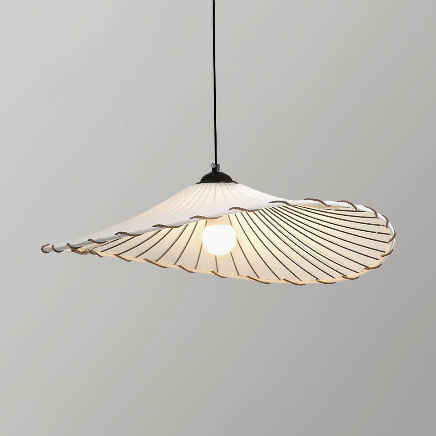 Liana pleated pendant lamp full view showing beige fabric shade and black metal hardware