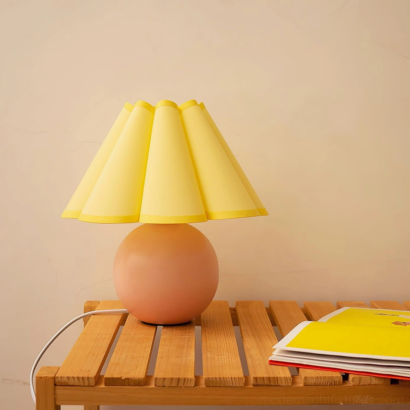 Light pink and yellow pleated sunburst table lamp contemporary color combination on white ceramic base