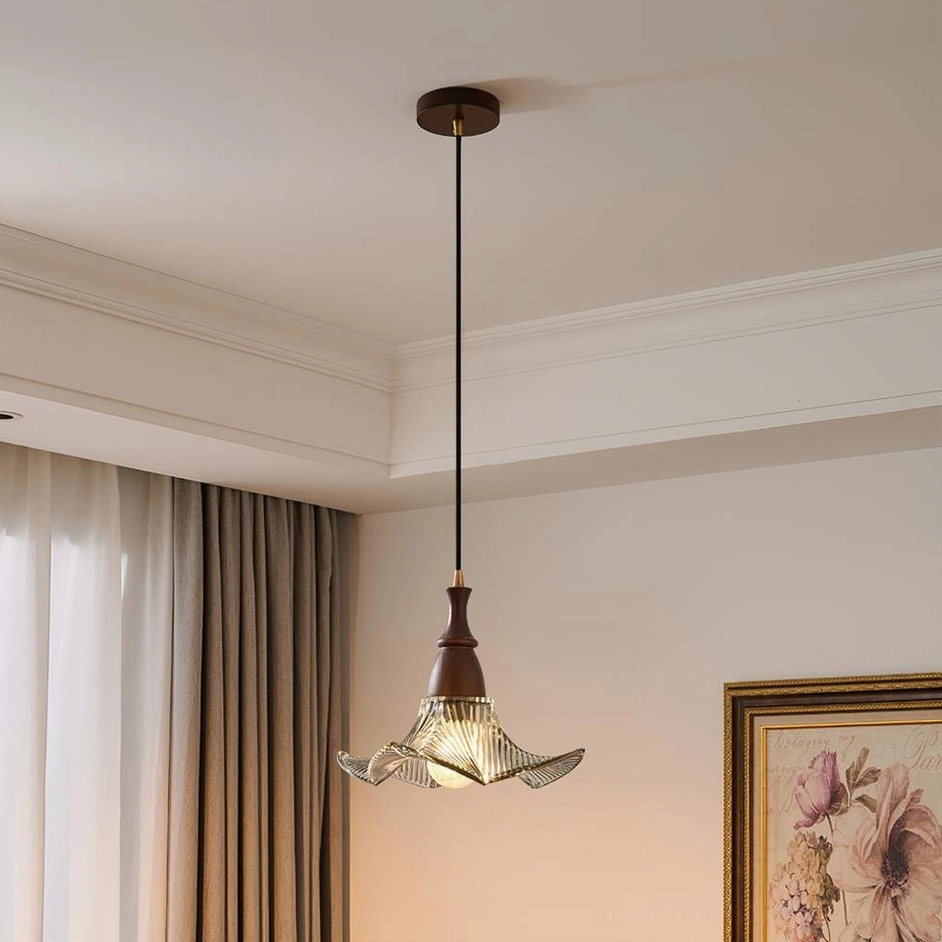 Lila dark green forest ribbed glass pendant light with glowing bulb and wood hardware