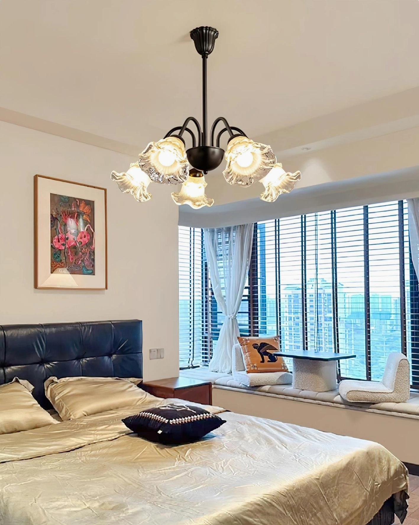 Lilura botanical chandelier installation detail showing metal arms and glass shade assembly