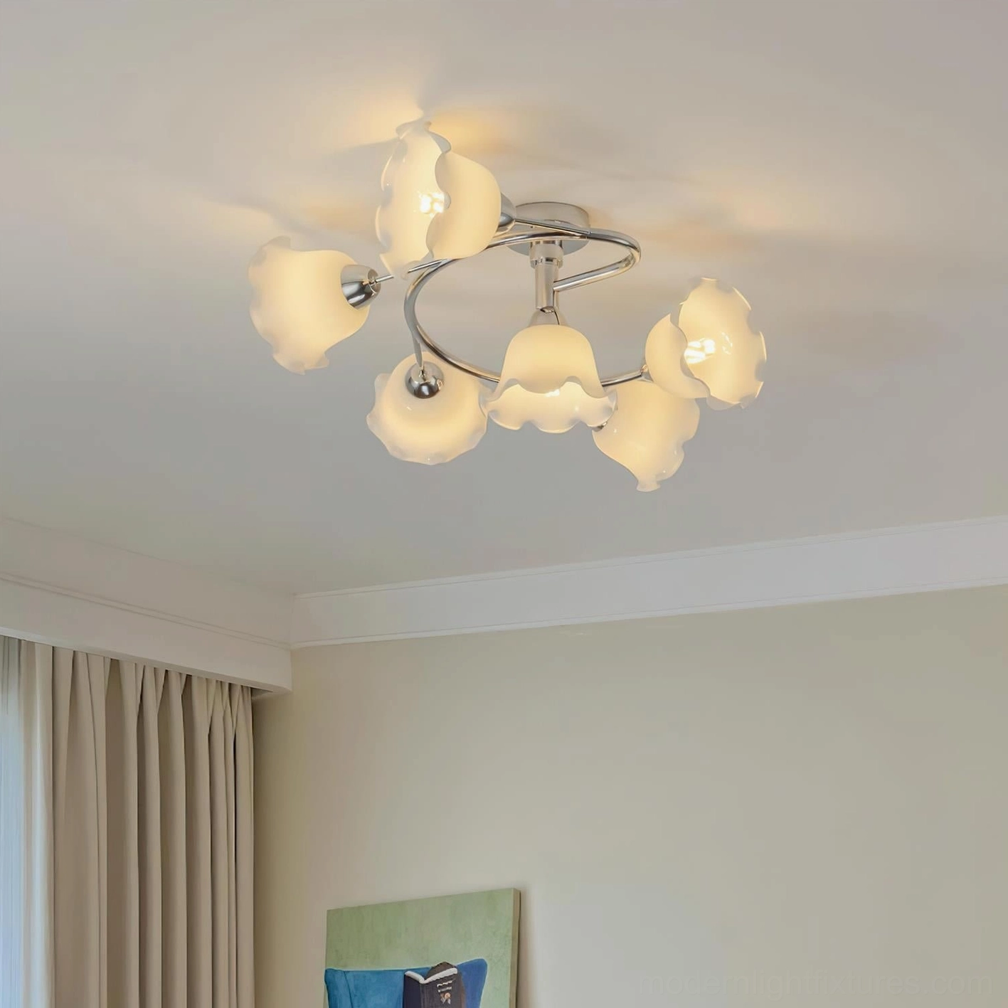 Frosted glass petal ceiling light fixture illuminating spacious room with warm ambient glow