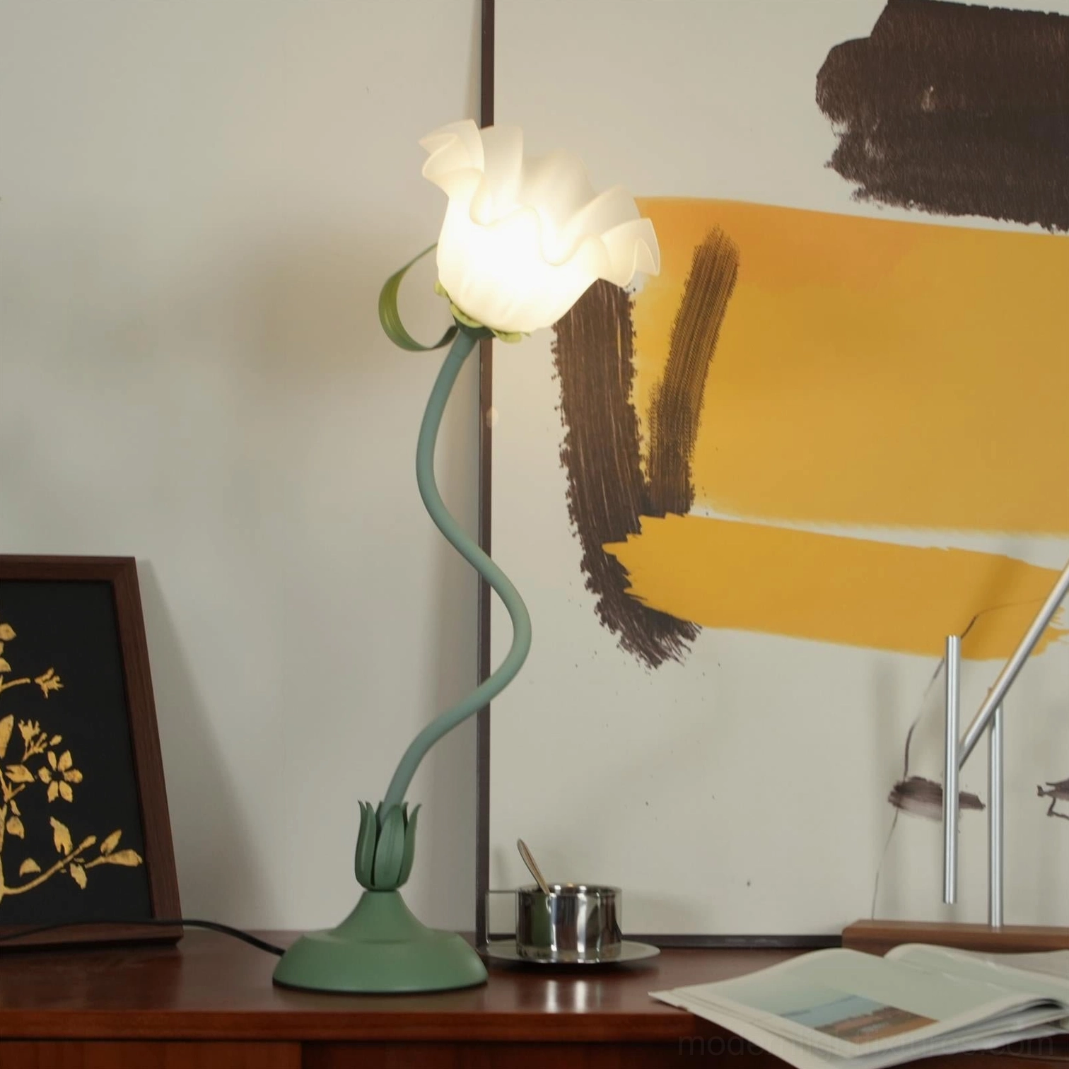 Lily flower table lamp with three-color changing light feature displayed on side table accent