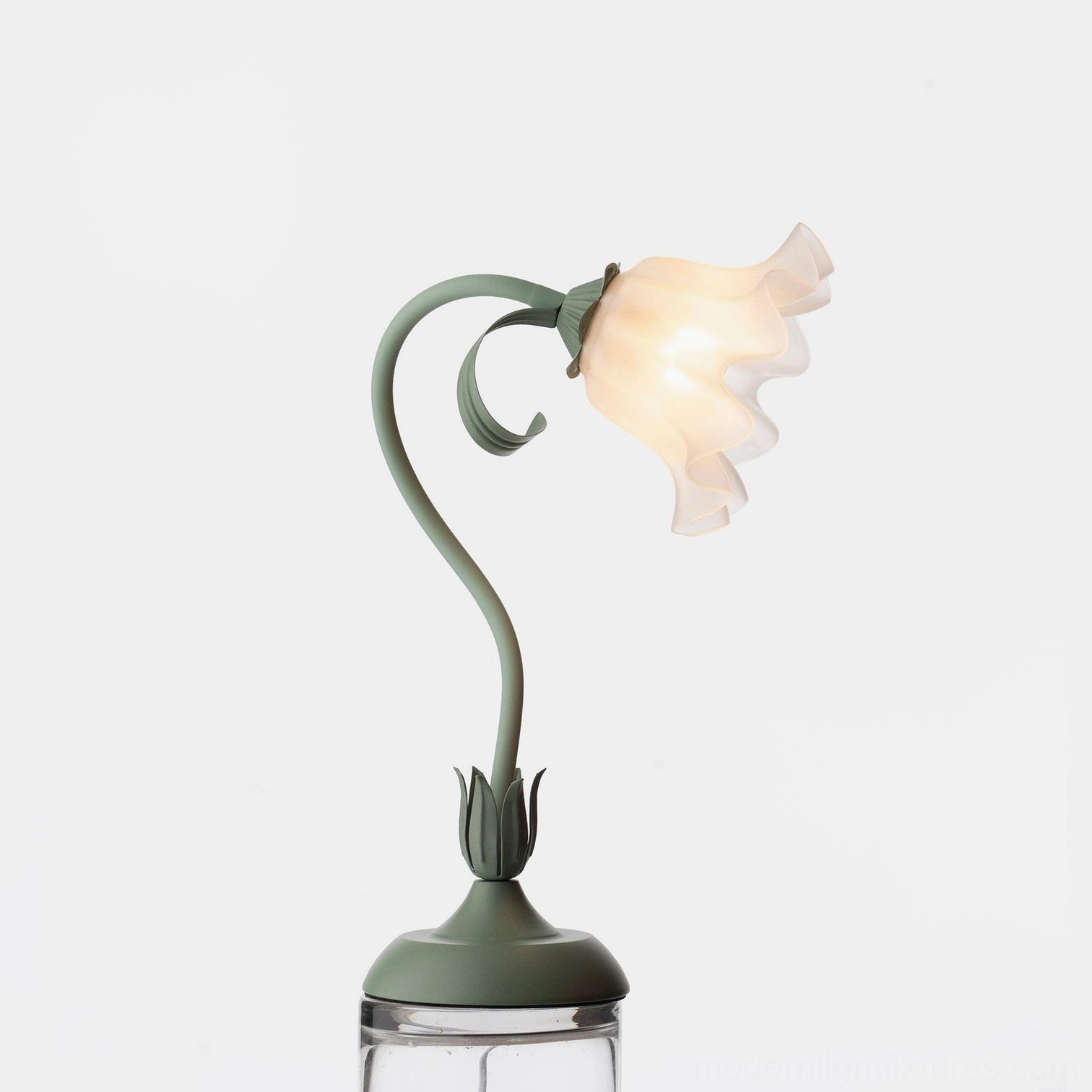 Lily flower table lamp with green white color option on bedside table in bedroom interior