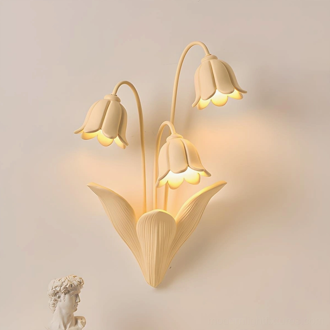 Lily of the Valley Wall Sconce Illuminated - Warm Beige Resin Botanical Light Fixture Studio Shot
