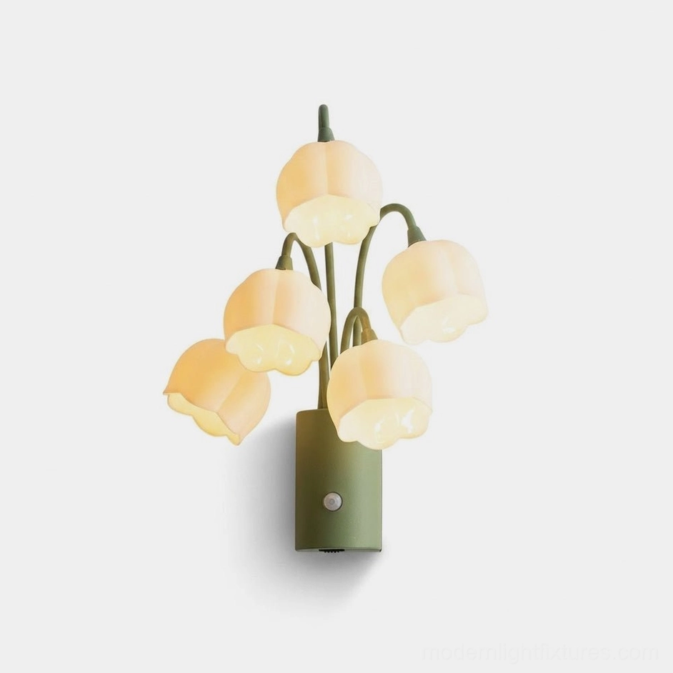 Lily-of-the-valley motion sensor wall sconce with four frosted acrylic bell-flower shades on green iron stems against white background