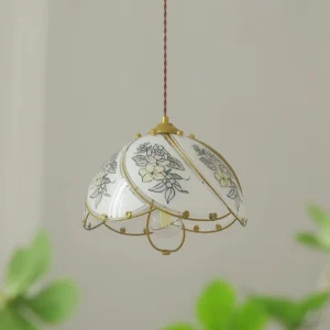 Decorative lily pendant lamp with hand-engraved floral patterns on white glass and golden brass accents