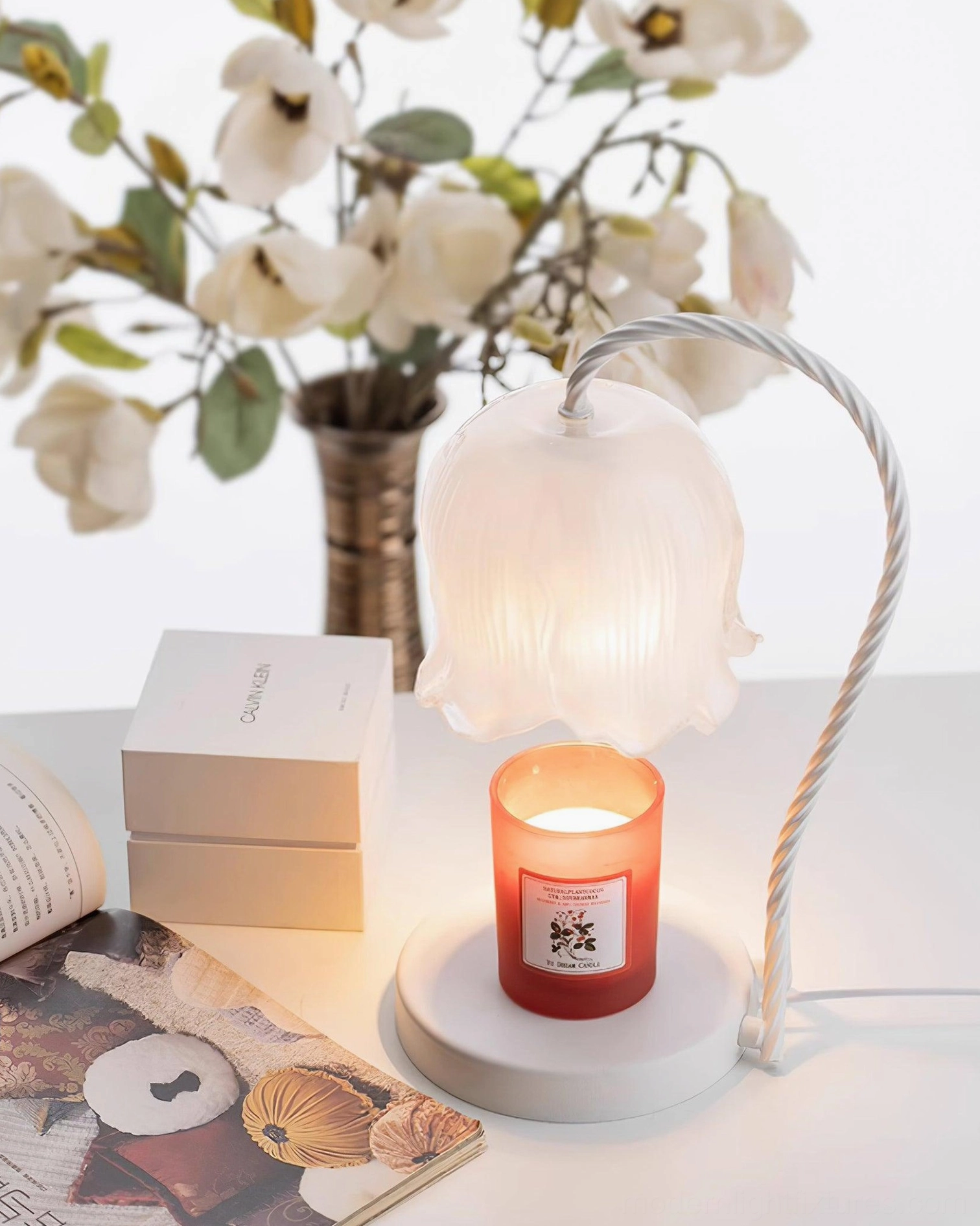 Lily of the valley candle warmer lamp product lifestyle photo in bedroom ambiance setting