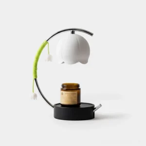 Lily of the Valley Candle Warmer Lamp with chrome frame and white bell shade featuring hanging botanical ornaments on white background