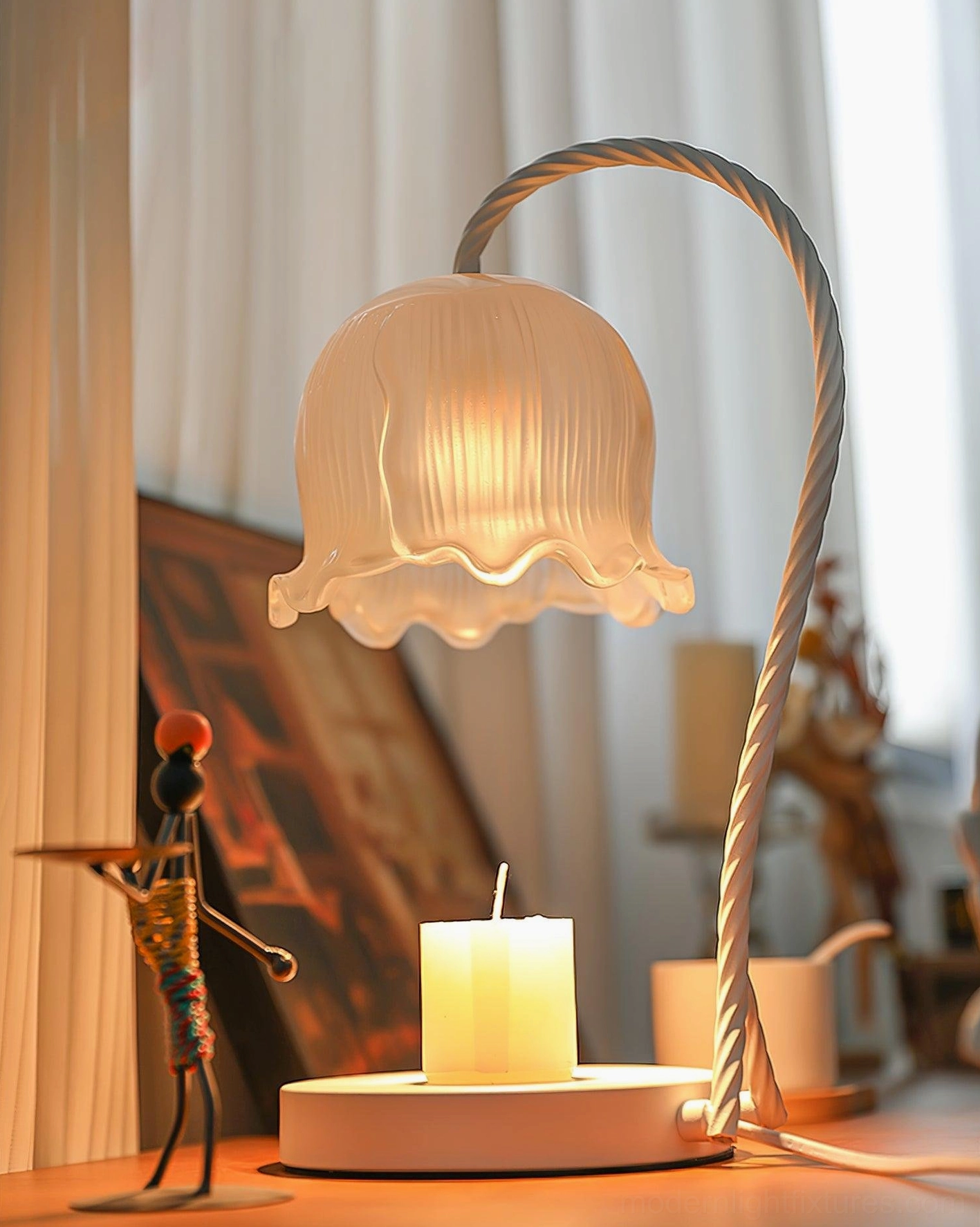 Modern frosted glass candle warmer lamp, close-up detail of metal and glass construction