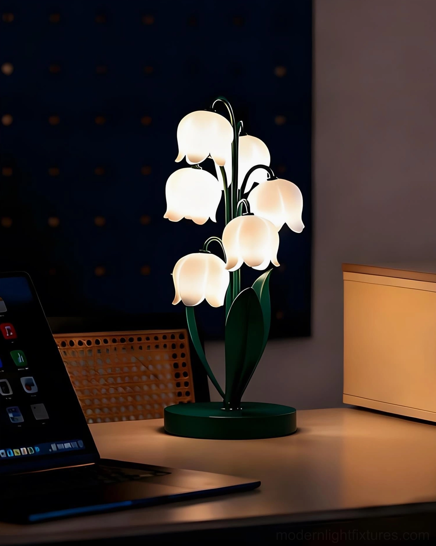 Modern sculptural table lamp inspired by lily of the valley flowers with curved metal stems and petal-shaped diffuser creating soft ambient lighting