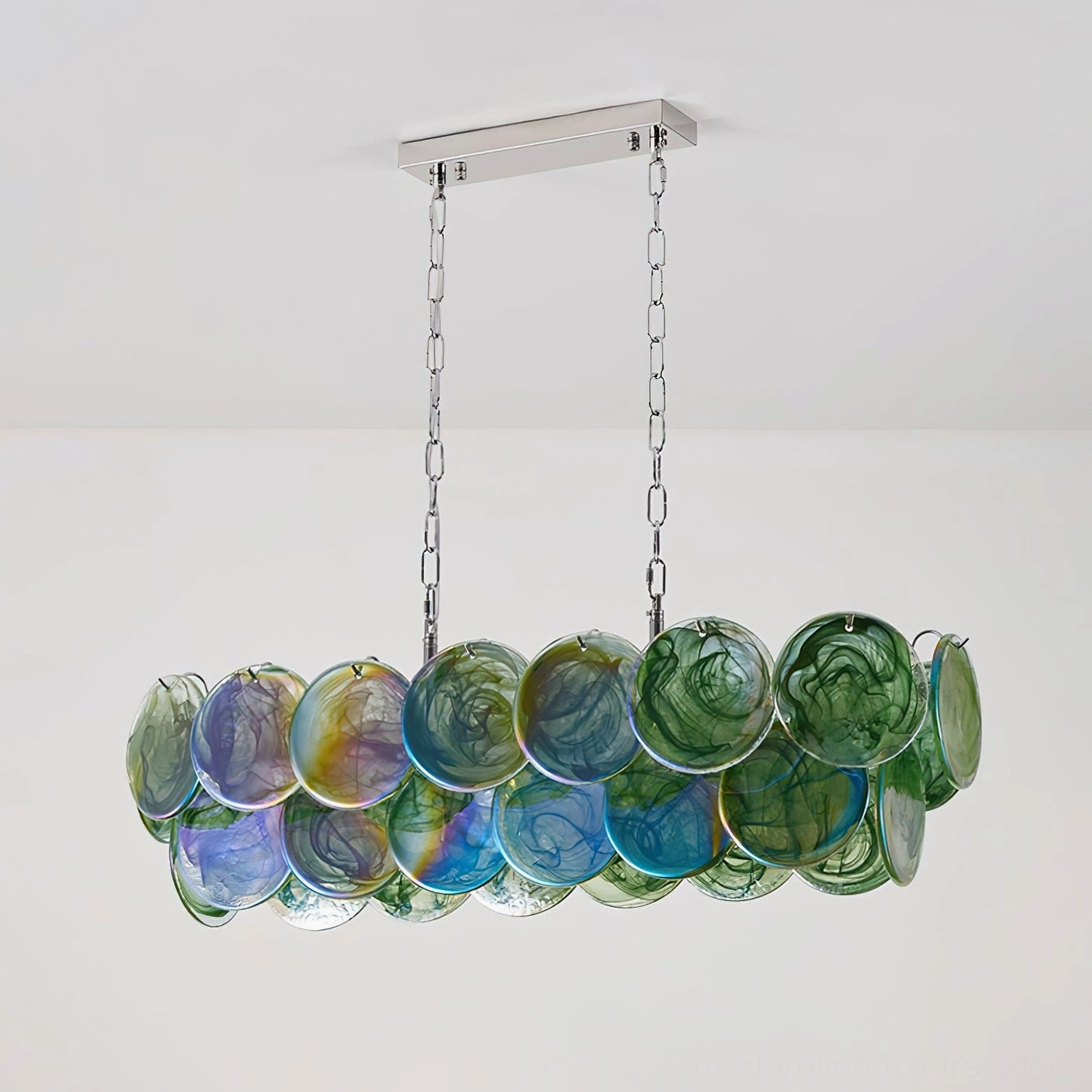 Modern linear chandelier with green-blue-purple marbled glass discs and silver metal frame
