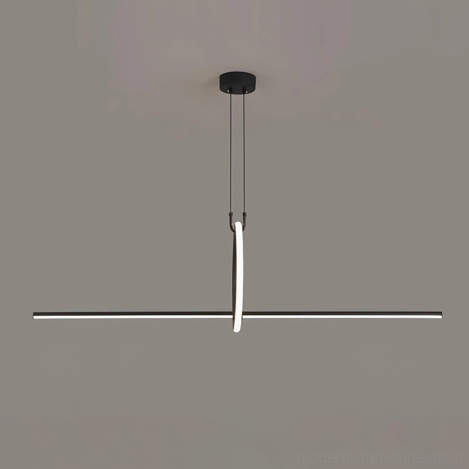 Matte black linear island pendant light providing focal-point illumination in contemporary kitchen design