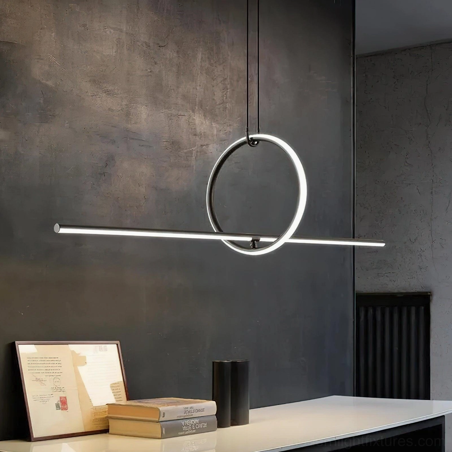 Close-up view of linear ring LED pendant light with light metal finish on console table display area