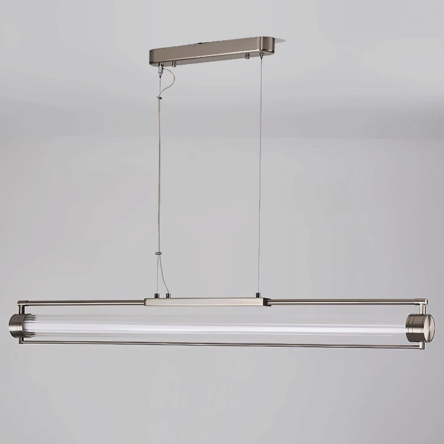 Linear LED pendant light fixture detail - sand nickel and clear glass construction with integrated LED technology