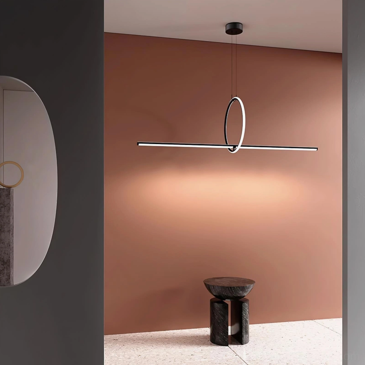 Contemporary linear pendant light with light metal finish providing warm ambient glow in minimalist residential space