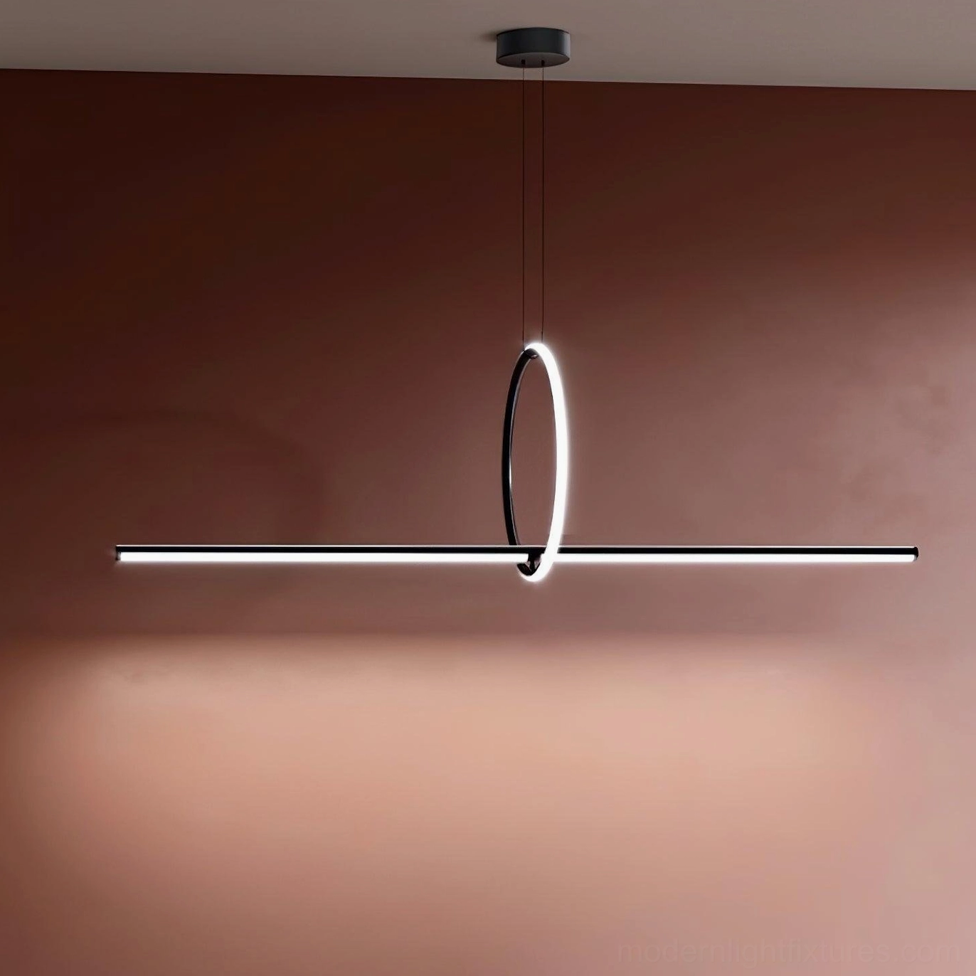 Linear ring pendant fixture in light metal finish creating ambient illumination in contemporary residential setting