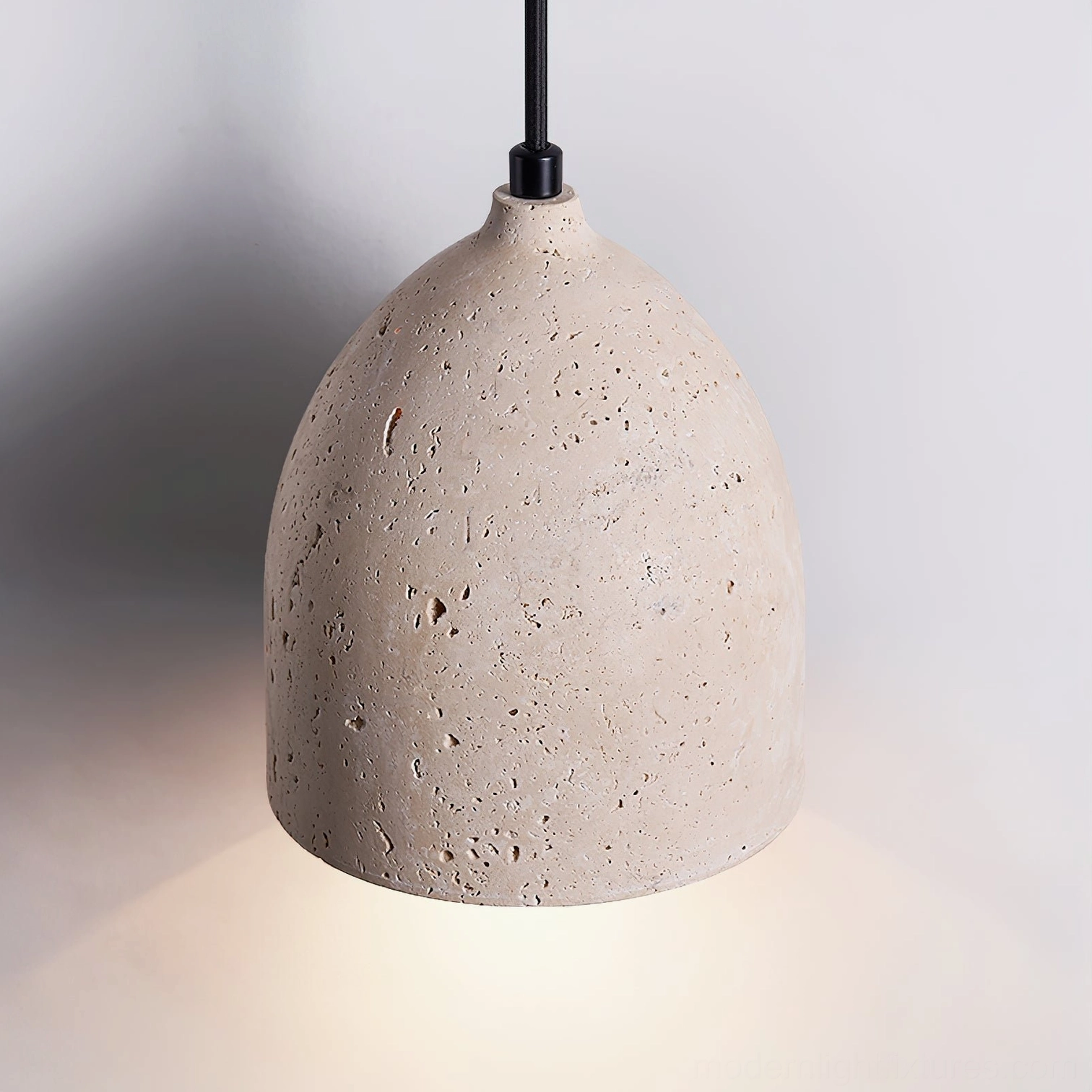 Linear three-head travertine pendant light configuration showcasing multiple stone shades with coordinated design