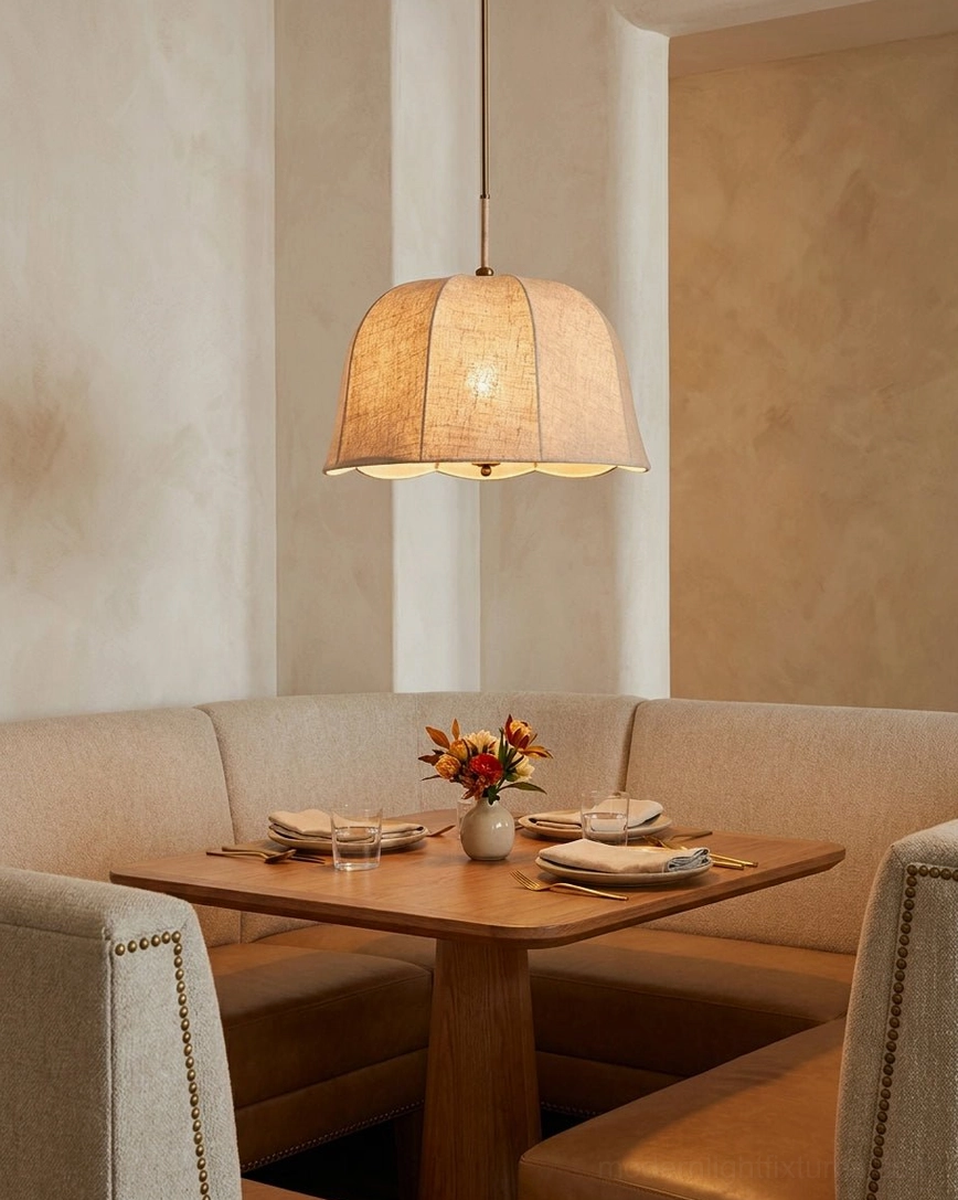 Linen dome pendant light with bottom diffuser detail showing warm light diffusion through natural fabric shade