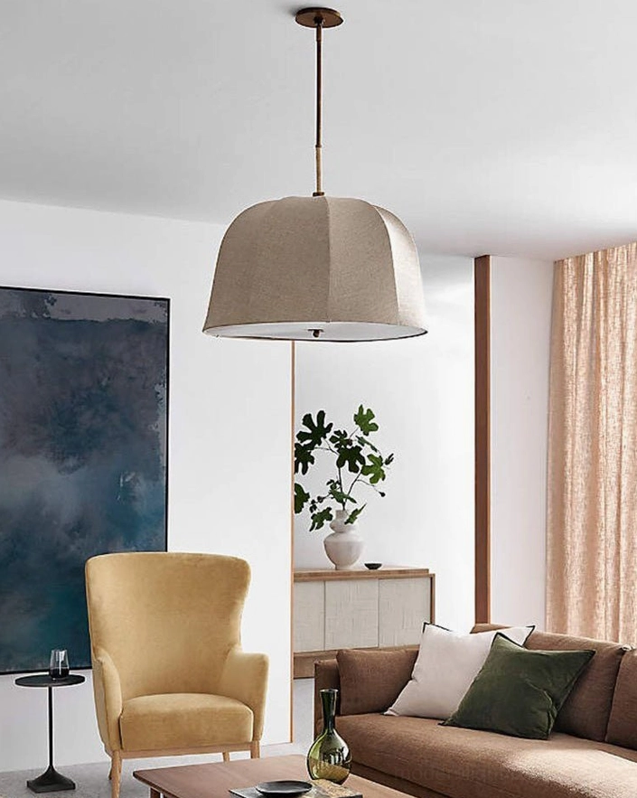 Overhead view of taupe linen dome pendant in modern open-plan living room with minimalist wabi-sabi decor