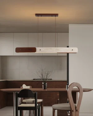 Linero modern linear pendant light installed above dining table with warm white 3000K LED illumination