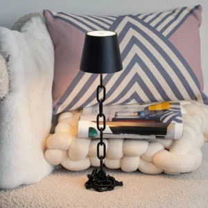 Linke table lamp in modern living room with warm ambient glow on side table with neutral decor