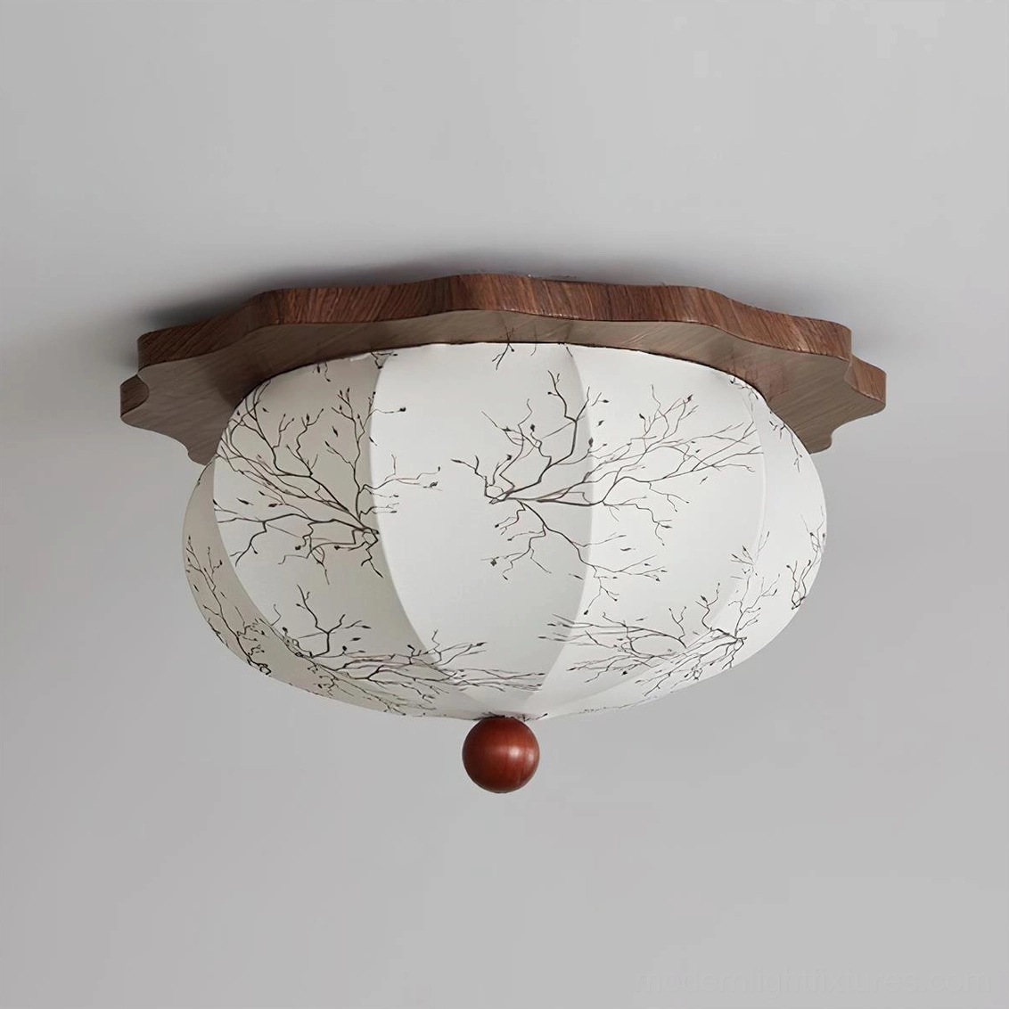 Close-up detail of Linora ceiling light showing intricate hand-drawn branch embroidery on white fabric shade