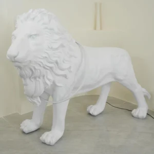 Three-quarter view of white lion floor lamp unlit studio setting