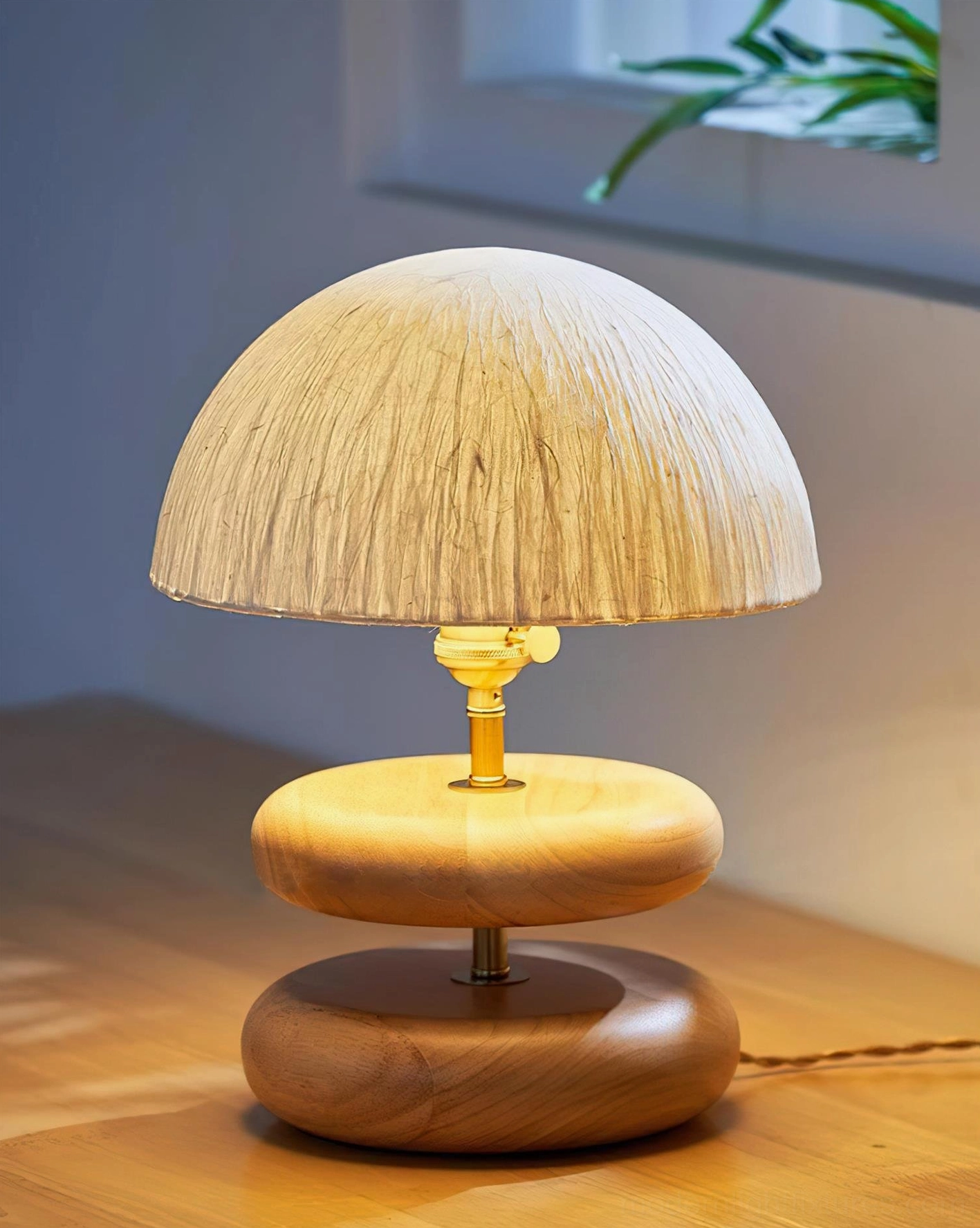 Illuminated stacked wood ring table lamp warm glow ambient lighting wooden desk modern minimalist lighting