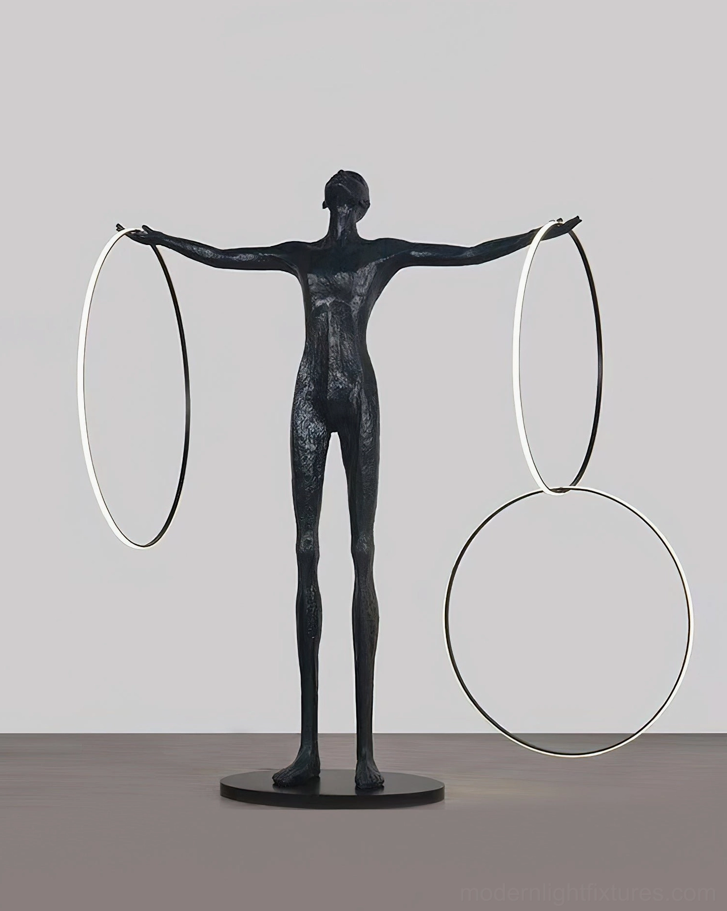 Liva floor lamp with partial ring illumination, two lit geometric rings, modern minimalist styling