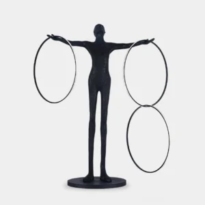 Liva Sculpture Floor Lamp front view with three geometric rings, matte black resin body on white studio background