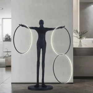 Liva geometric floor lamp with illuminated warm white rings in contemporary minimalist bathroom interior