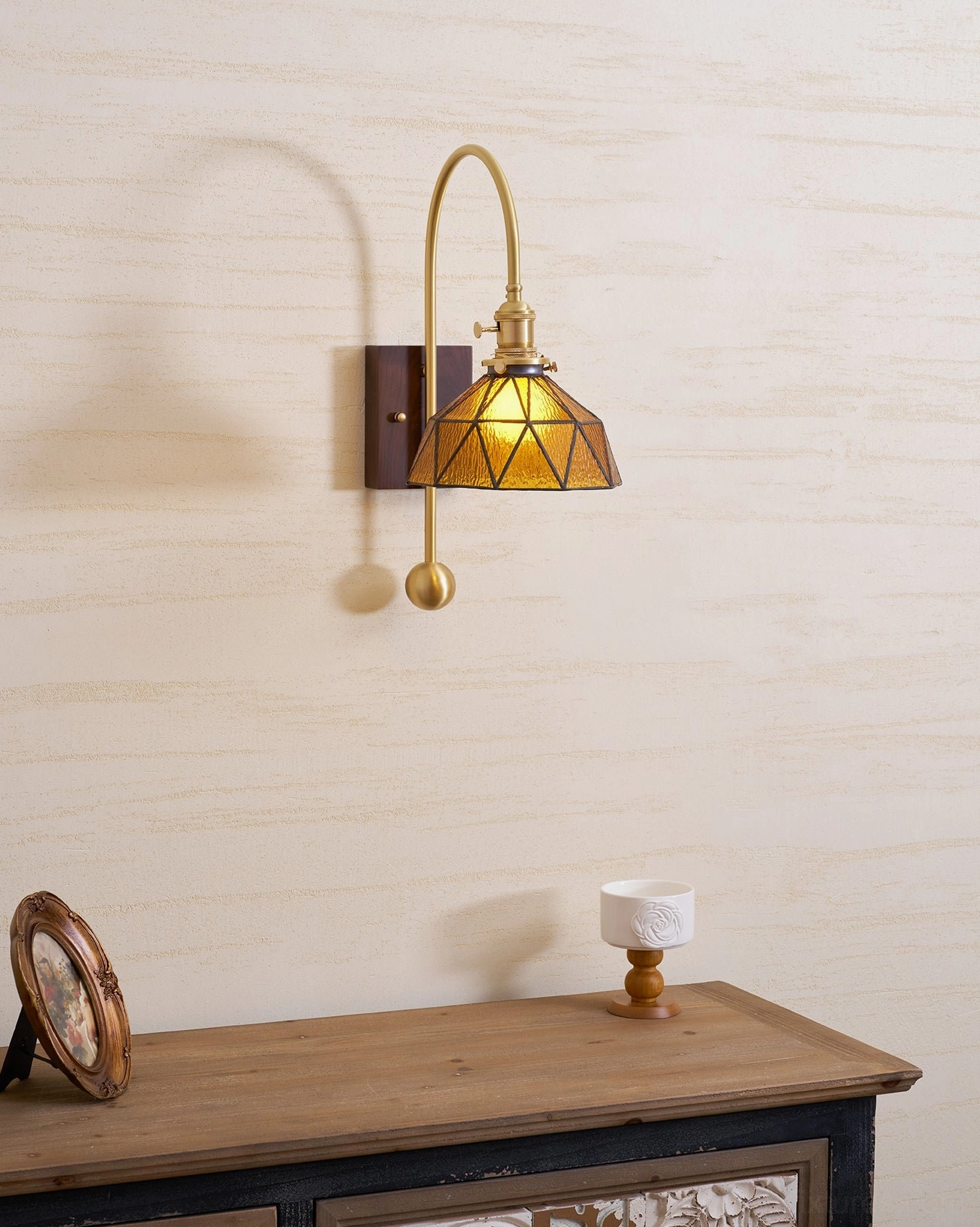 Living room feature wall sconce positioned for gallery-like sophistication