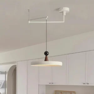 Modern swing arm pendant light in minimalist kitchen dining area - beige and white variant