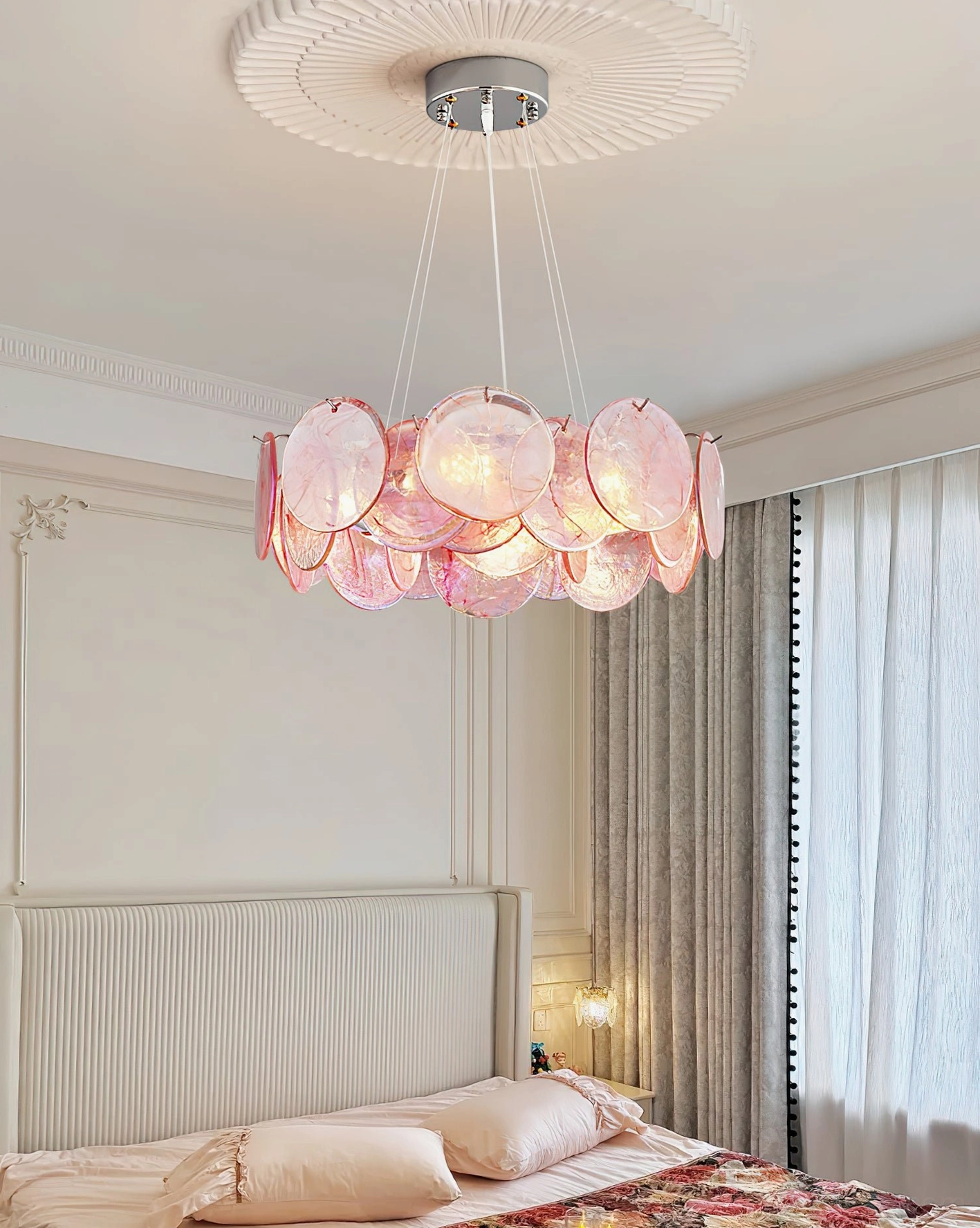 Loire pink glass chandelier artistic lighting sculpture creating soft halo glow effect