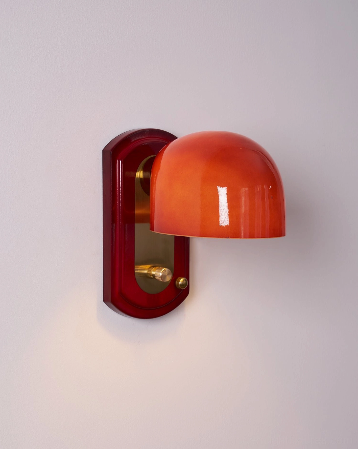 Lolita dome wall sconce in art deco revival interior with geometric patterns and vintage luxury aesthetic
