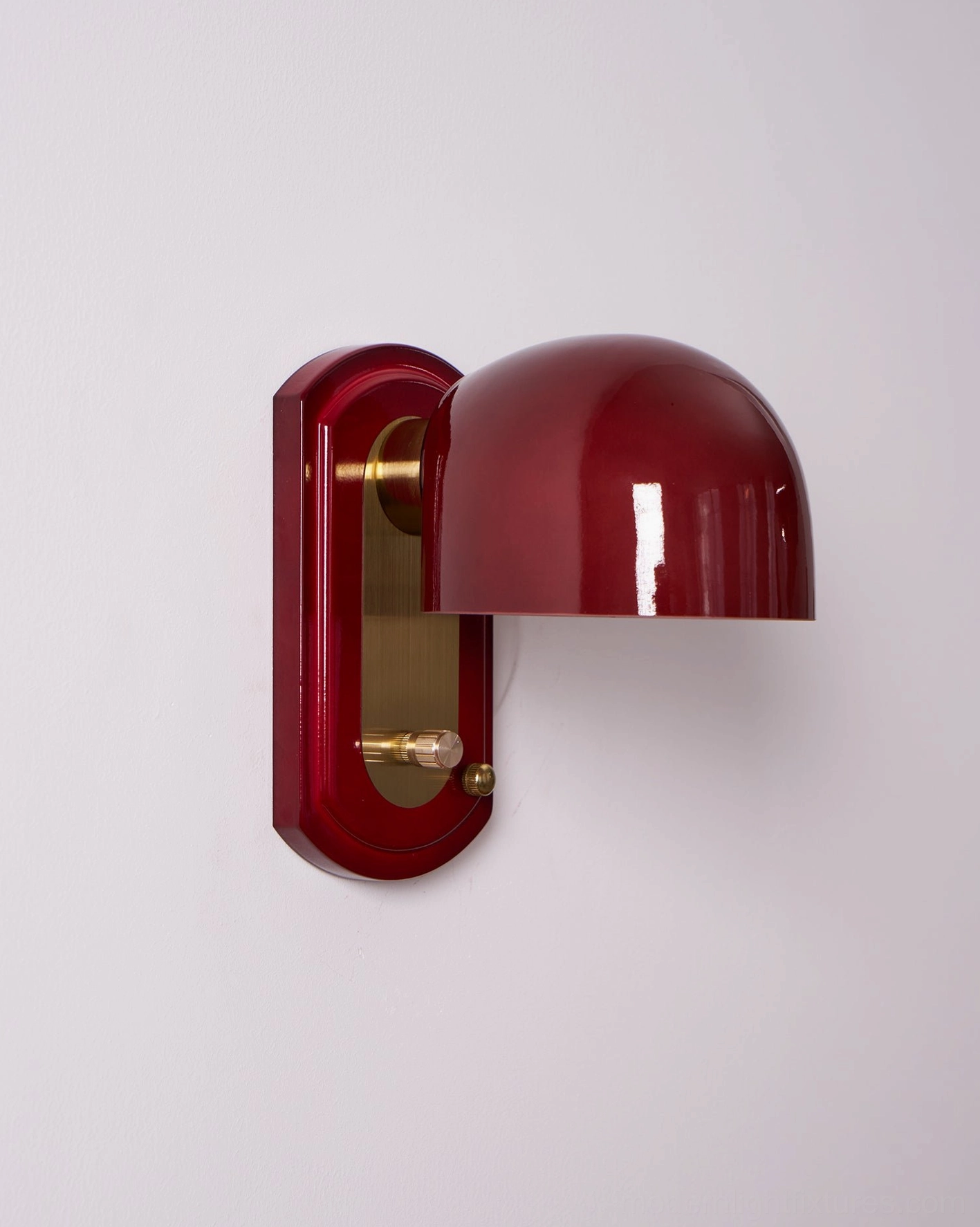 Lolita dome wall sconce in bohemian warm interior with textiles and warm earthy color palette styling