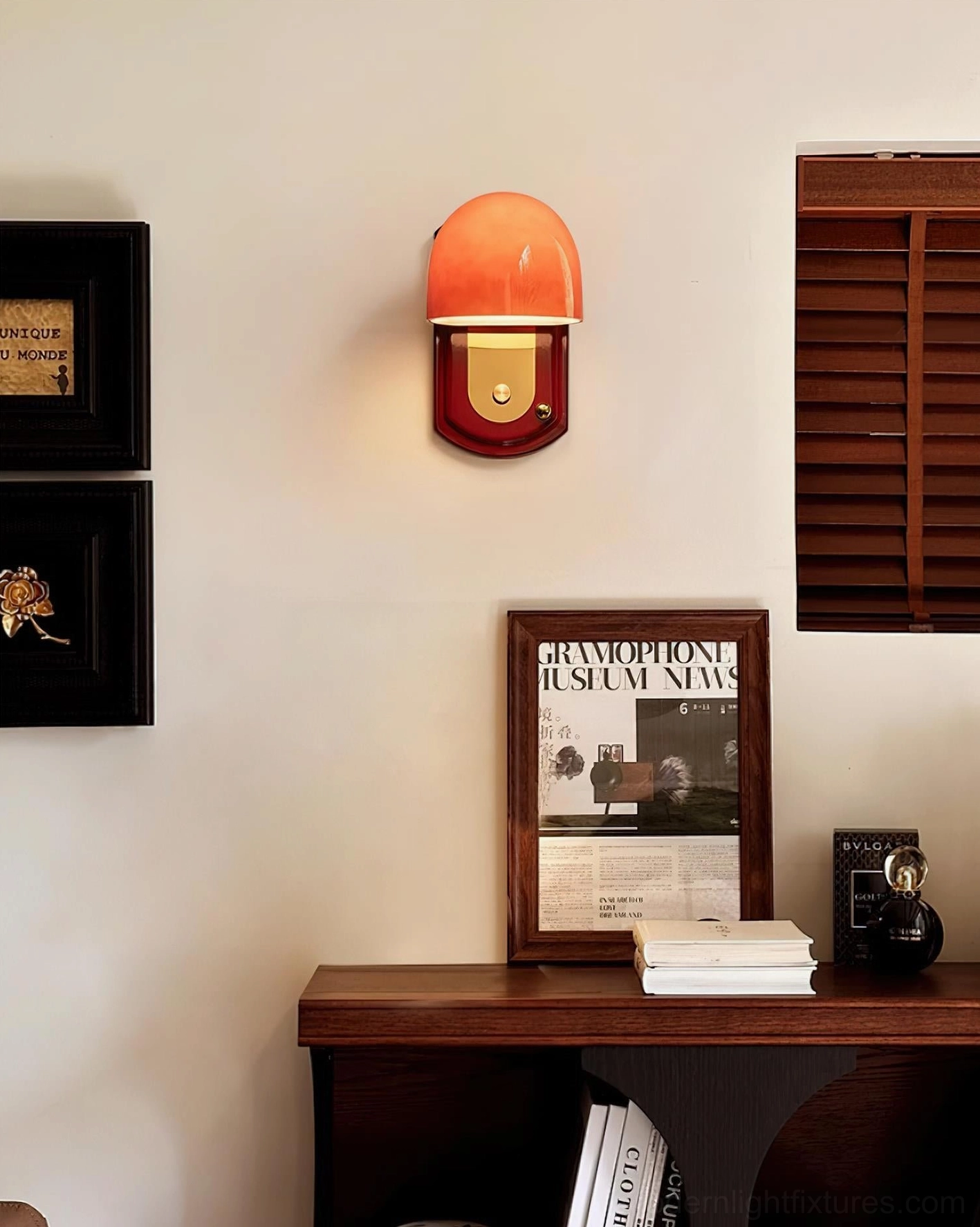 Lolita wall sconce in contemporary minimalist interior with layered ambient lighting design approach